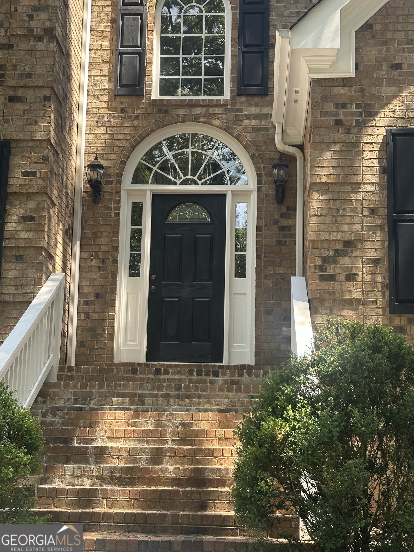 65 Spratlin Way Hull, GA 30646 - Photo 5 of 35 a front view of a house with windows