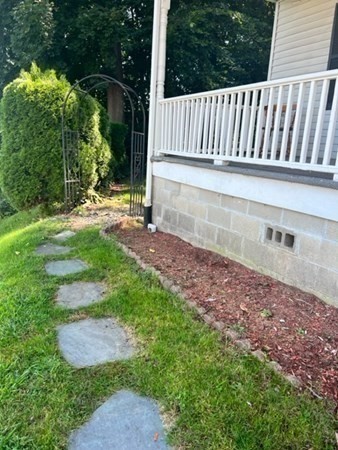 45-47 South Street Three Rivers, MA 01080 - Photo 5 of 34 a view of small yard with large trees and wooden fence
