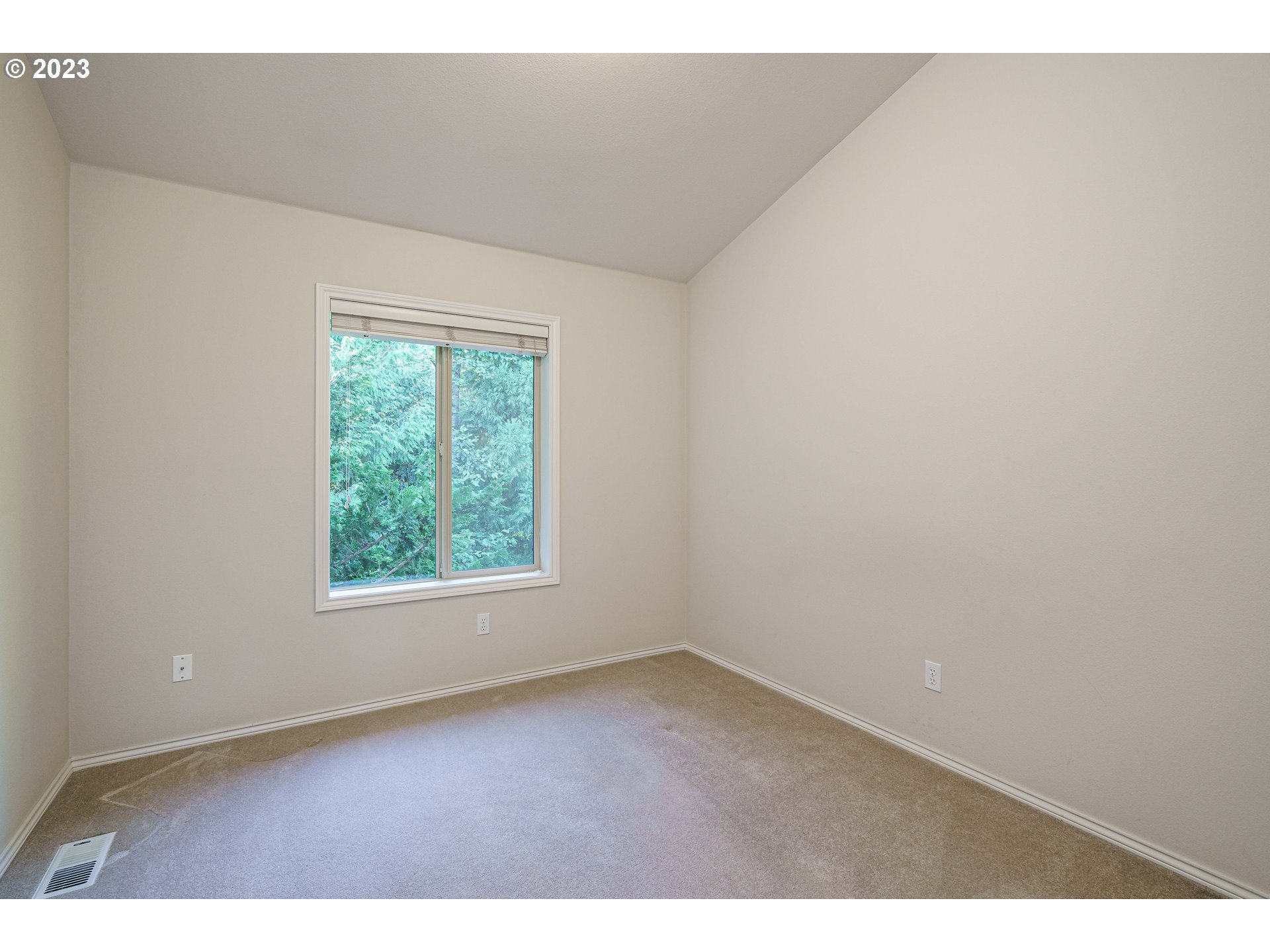 1601 Southeast Elliott Avenue Gresham, OR 97080 - Photo 22 of 48 an empty room with wooden floor and windows