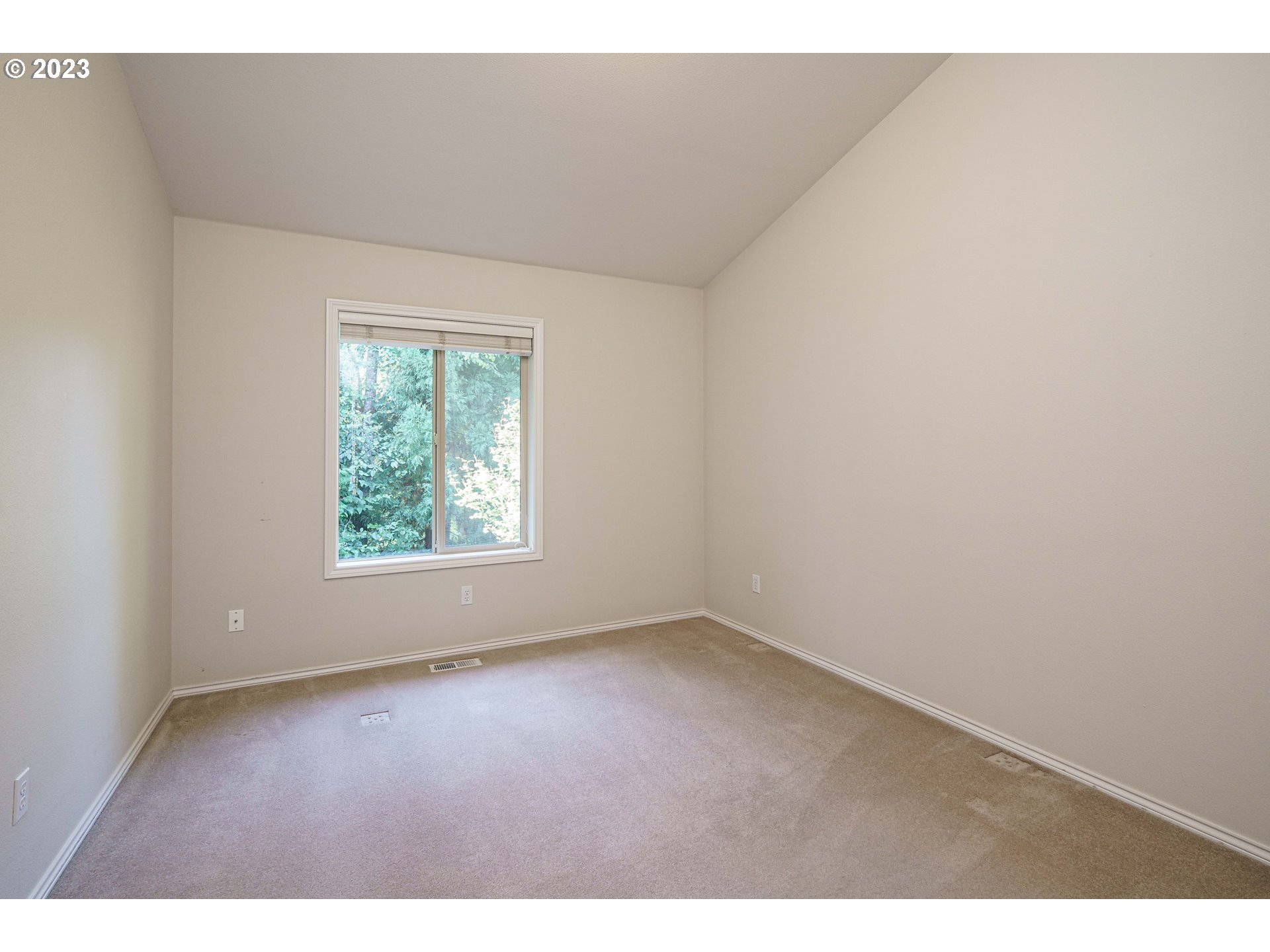 1601 Southeast Elliott Avenue Gresham, OR 97080 - Photo 25 of 48 an empty room with wooden floor and windows