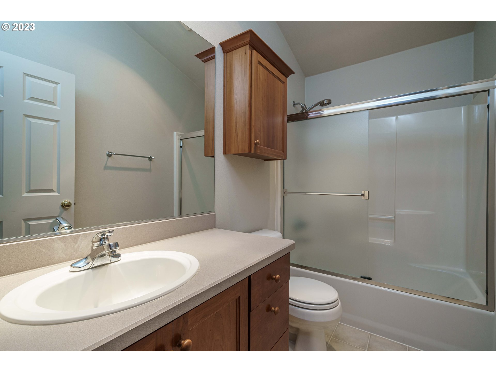 1601 Southeast Elliott Avenue Gresham, OR 97080 - Photo 28 of 48 a bathroom with a sink a toilet and shower