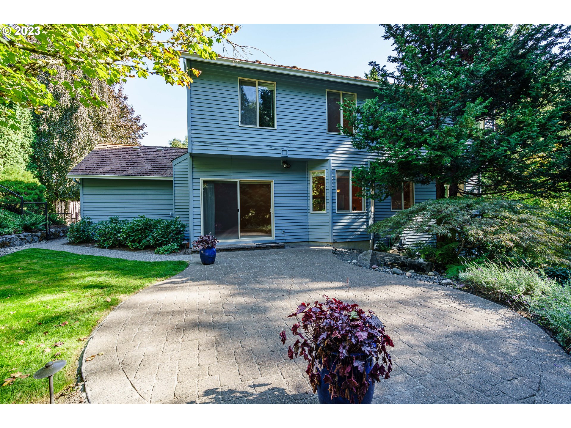 1601 Southeast Elliott Avenue Gresham, OR 97080 - Photo 32 of 48 a view of a house with yard and tree s