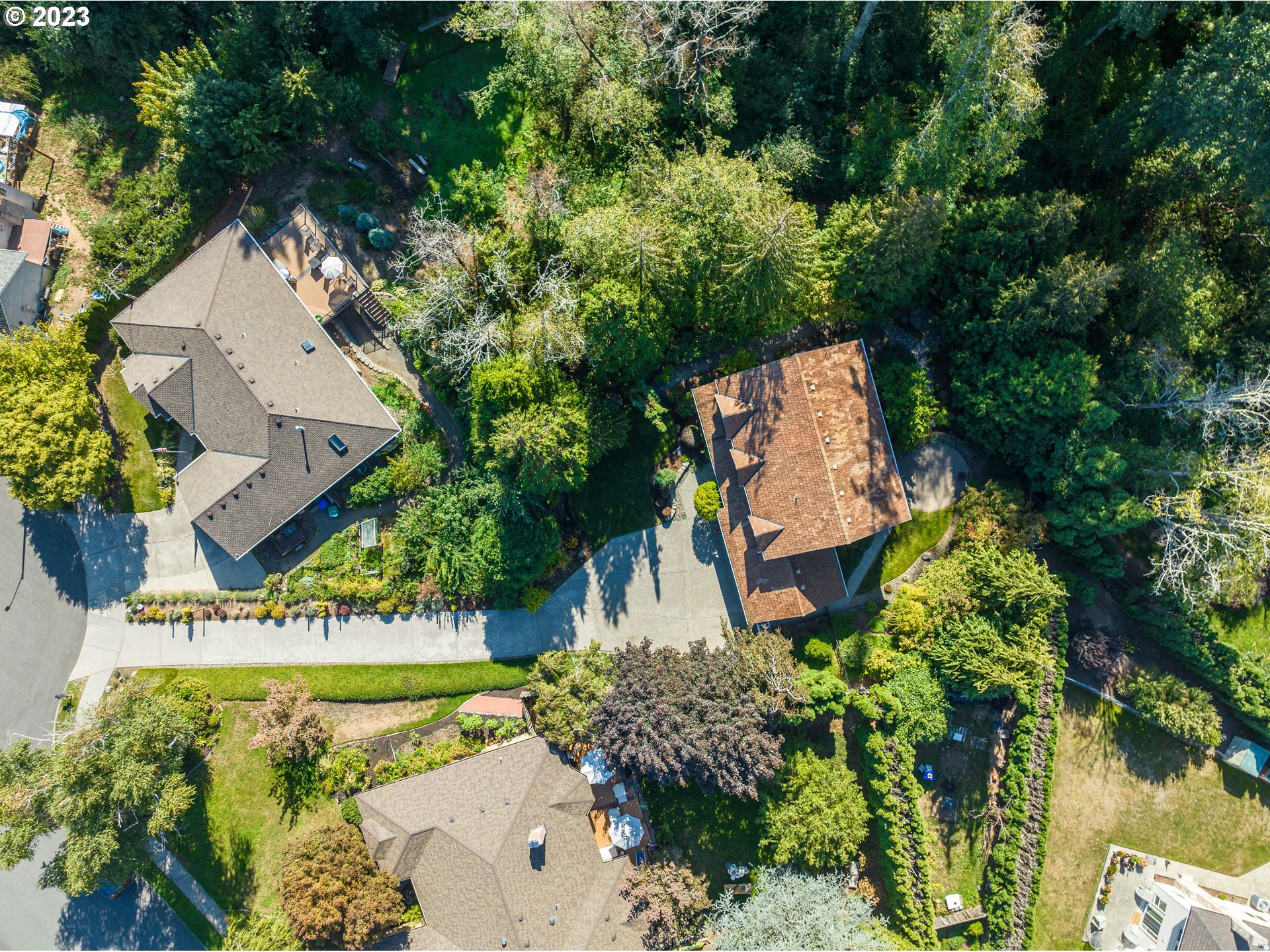 1601 Southeast Elliott Avenue Gresham, OR 97080 - Photo 39 of 48 an aerial view of a house with a garden and swimming pool