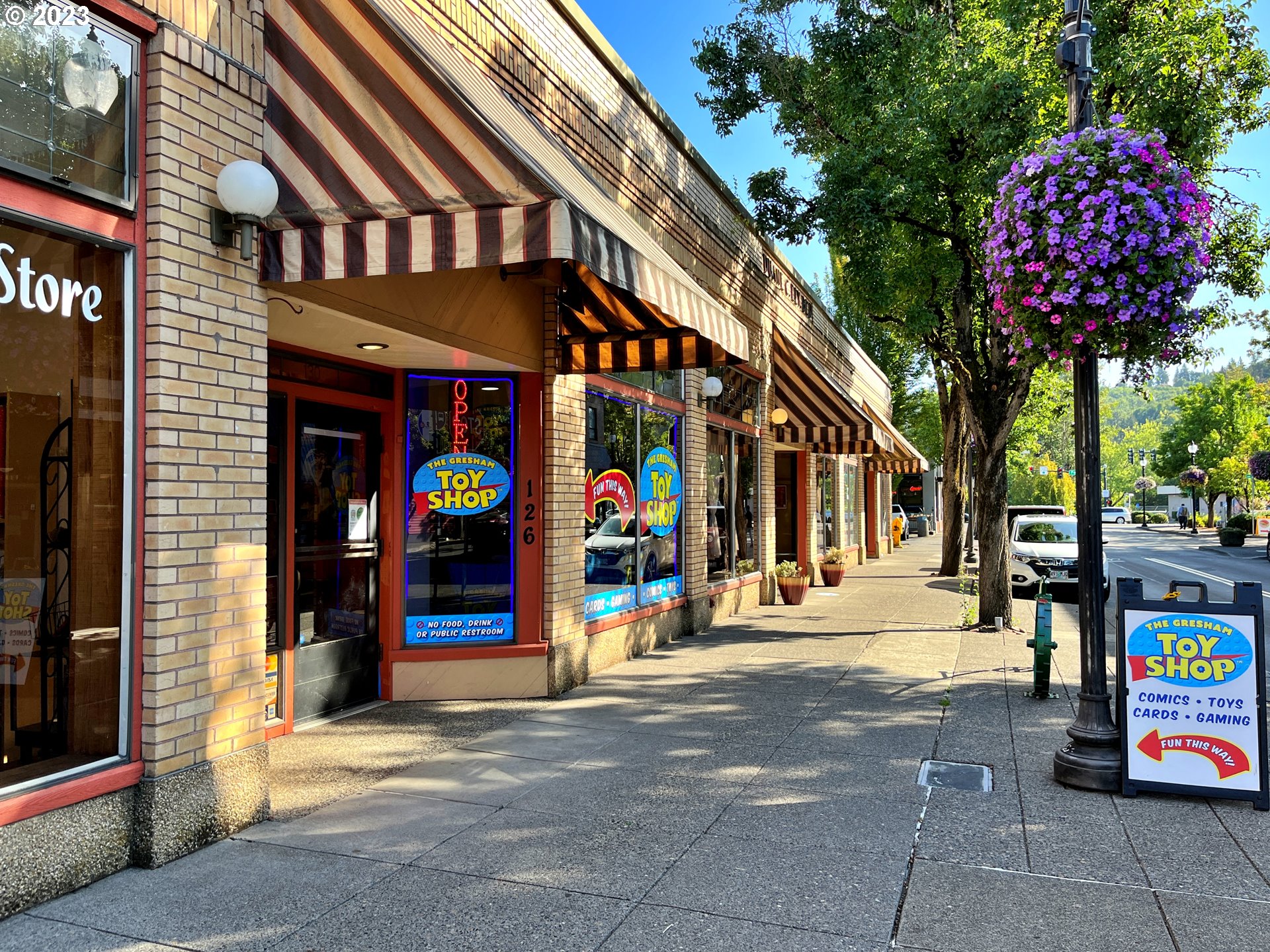 1601 Southeast Elliott Avenue Gresham, OR 97080 - Photo 47 of 48 a view of a street with stores