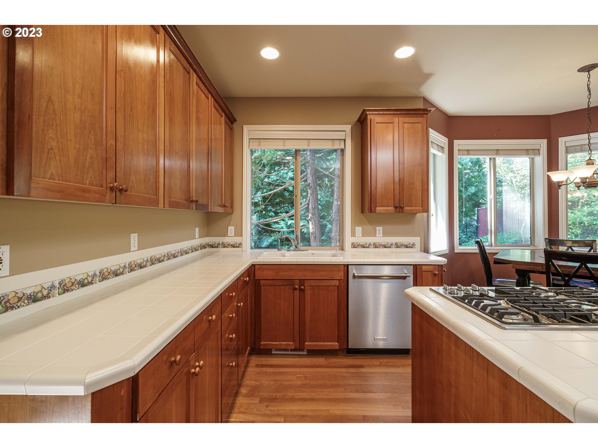 1601 Southeast Elliott Avenue Gresham, OR 97080 - Photo 7 of 48 a kitchen with a sink stove and cabinets