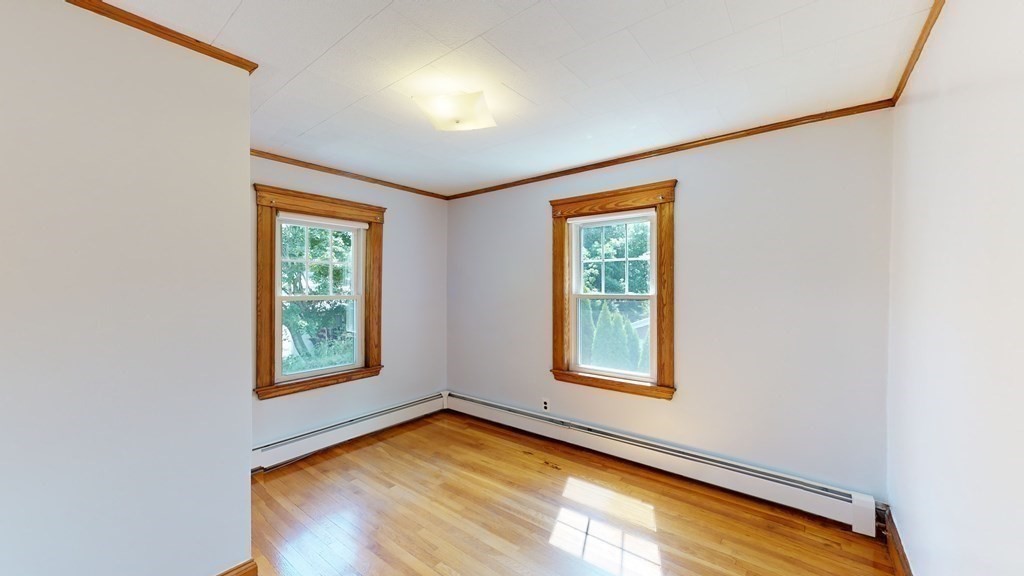 82 Roberts Road Medford, MA 02155 - Photo 19 of 30 an empty room with windows