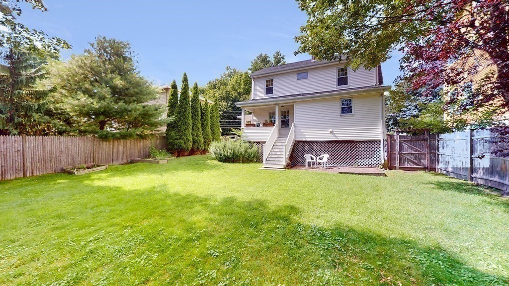 82 Roberts Road Medford, MA 02155 - Photo 27 of 30 a view of a back yard of the house