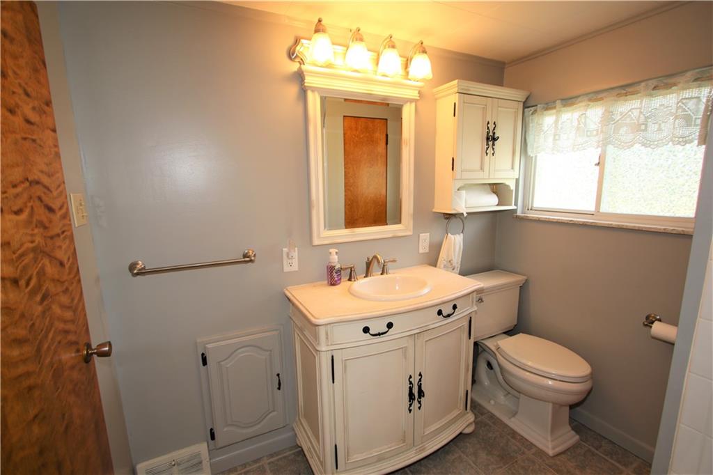 453 Simpson Howell Road Elizabeth, PA 15037 - Photo 15 of 25 Master Bath w/Ceramic Tile Flooring, Shelved Linen Closet, Sink & Vanity, & 5yo Jet Tub w/Shower Surround. Two Huge Hall Closets Flank the Bathroom Entrance for Additional Storage.