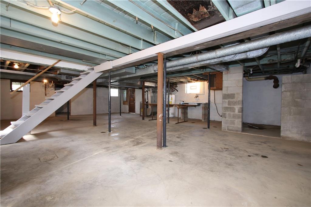 453 Simpson Howell Road Elizabeth, PA 15037 - Photo 18 of 25 34x27 HUGE Open Basement w/ Multiple Storage Rooms, Laundry Area, and Shower Room Off Right.