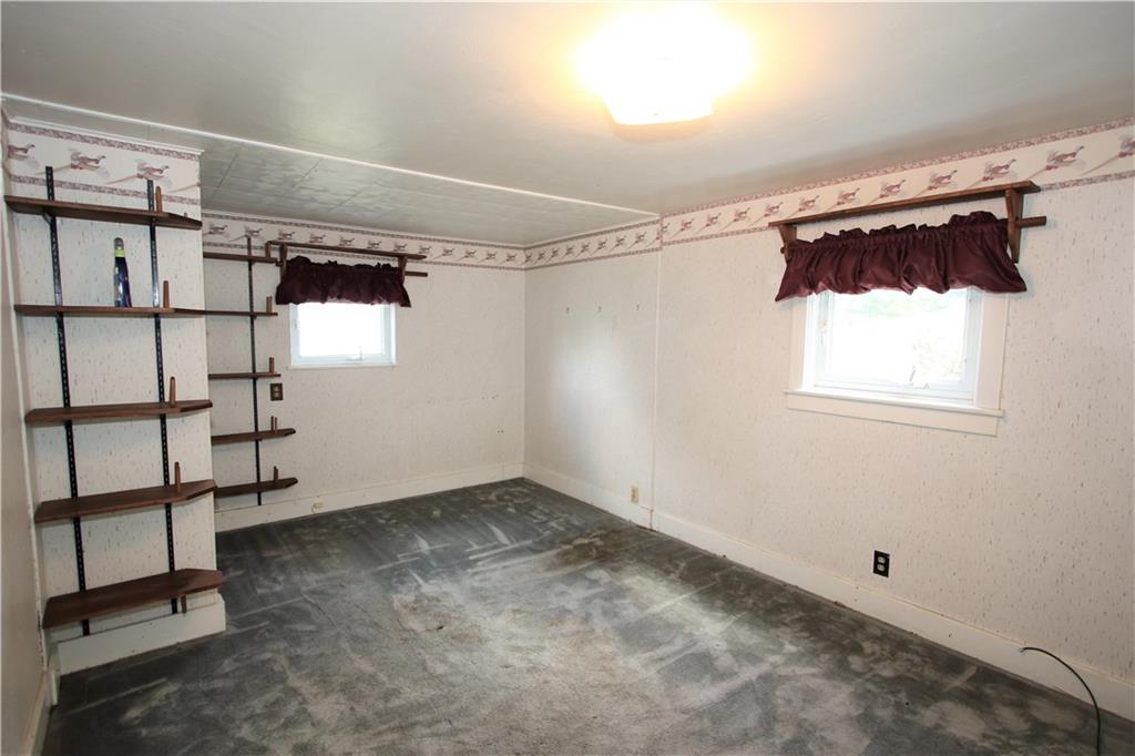 453 Simpson Howell Road Elizabeth, PA 15037 - Photo 21 of 25 Second Bedroom has Two Windows, Cable, and Extra Open Shelving in Addition to the Closet.