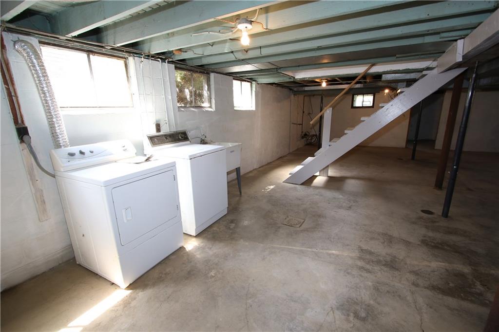 453 Simpson Howell Road Elizabeth, PA 15037 - Photo 22 of 25 Detail of the Light & Bright Laundry Area. Mechanics Information: Updated 150 AMP Electric, Newer HVAC ~6yo, HWT '07, Roof and Siding ~5yo.
