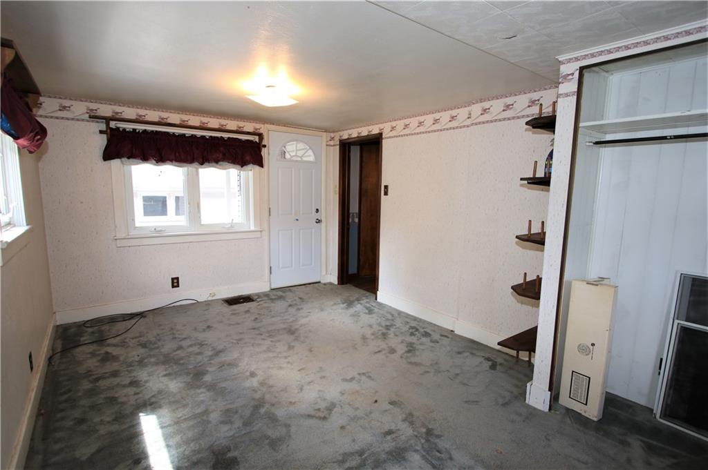 453 Simpson Howell Road Elizabeth, PA 15037 - Photo 8 of 25 15x10 Second Bedroom is at the End of the Hall and has a Separate Exterior Entrance Leading to Back Patio.