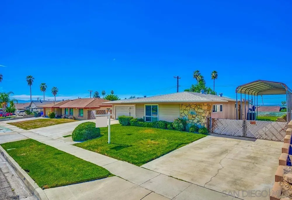 5970 Eucalyptus Drive Highland, CA 92346 - Photo 2 of 26 a view of a house with a yard