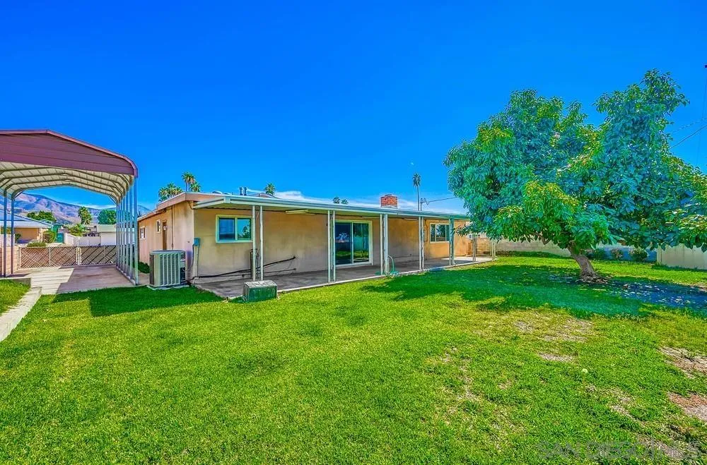 5970 Eucalyptus Drive Highland, CA 92346 - Photo 25 of 26 a front view of a house with a garden