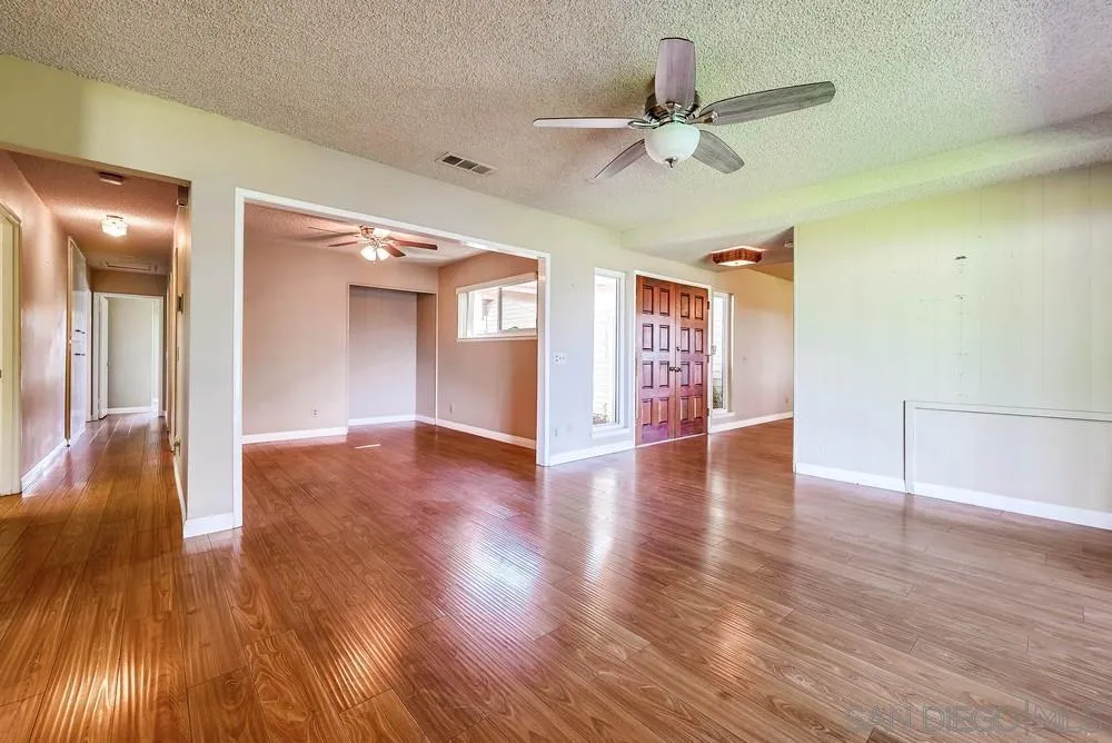 5970 Eucalyptus Drive Highland, CA 92346 - Photo 9 of 26 a view of a livingroom with wooden floor
