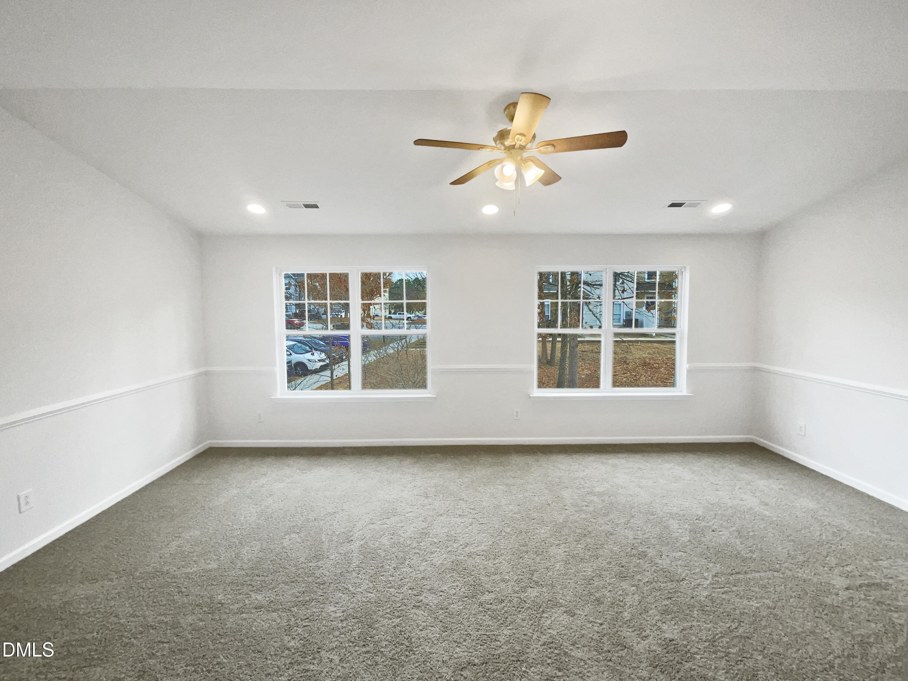 1301 Stone Manor Drive Raleigh, NC 27610 - Photo 4 of 16 a view of an empty room with a window
