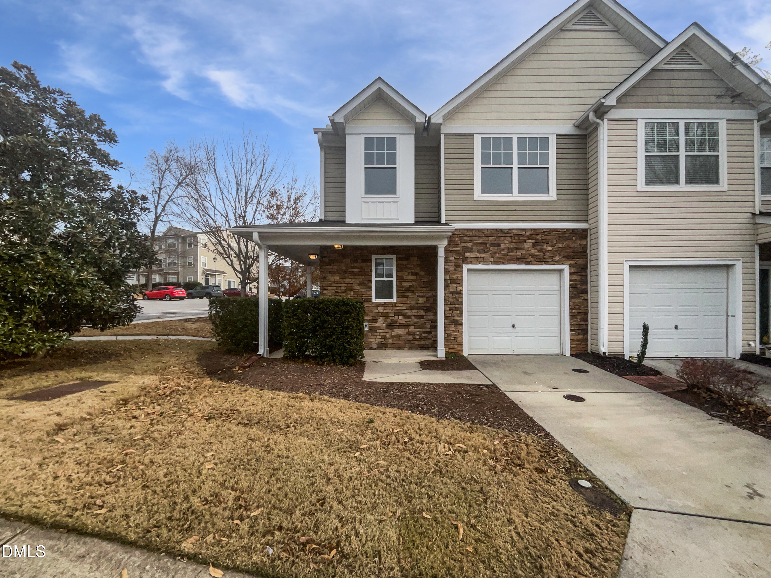 1301 Stone Manor Drive Raleigh, NC 27610 - Photo 6 of 16 a front view of a house with a yard