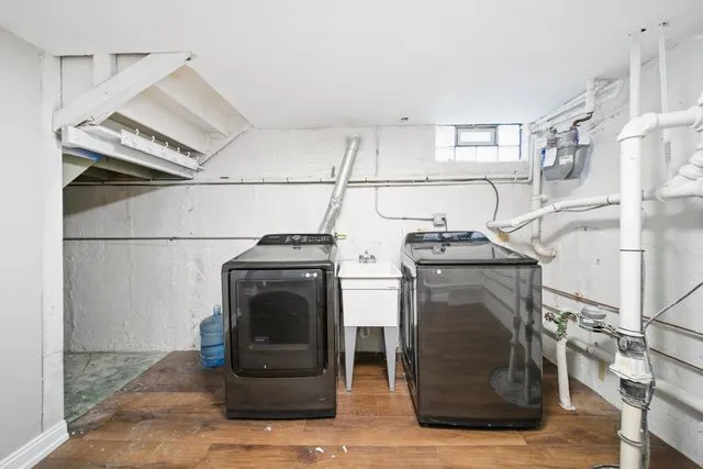 a utility room with dryer and washer