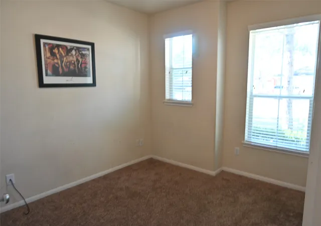 an empty room with shelves
