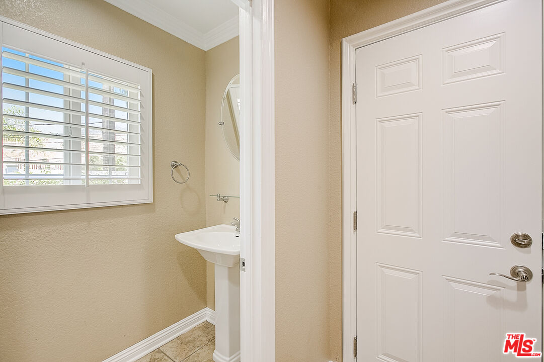 11038 Rhodesia Avenue Sunland, CA 91040 - Photo 19 of 36 a bathroom with a shower