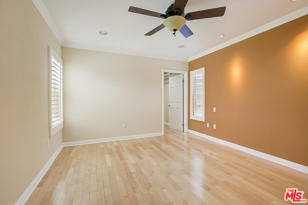 11038 Rhodesia Avenue Sunland, CA 91040 - Photo 22 of 36 a view of room with a ceiling fan and window