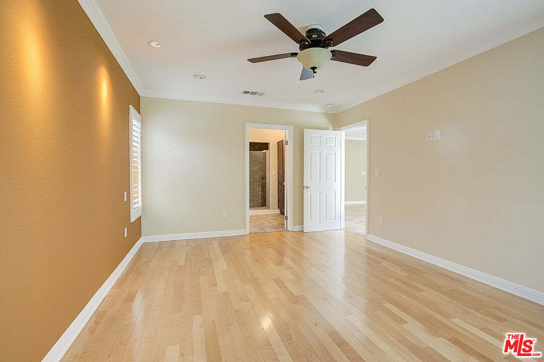 11038 Rhodesia Avenue Sunland, CA 91040 - Photo 23 of 36 wooden floor in an empty room