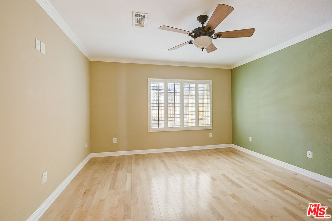 11038 Rhodesia Avenue Sunland, CA 91040 - Photo 28 of 36 a view of room with a ceiling fan and window