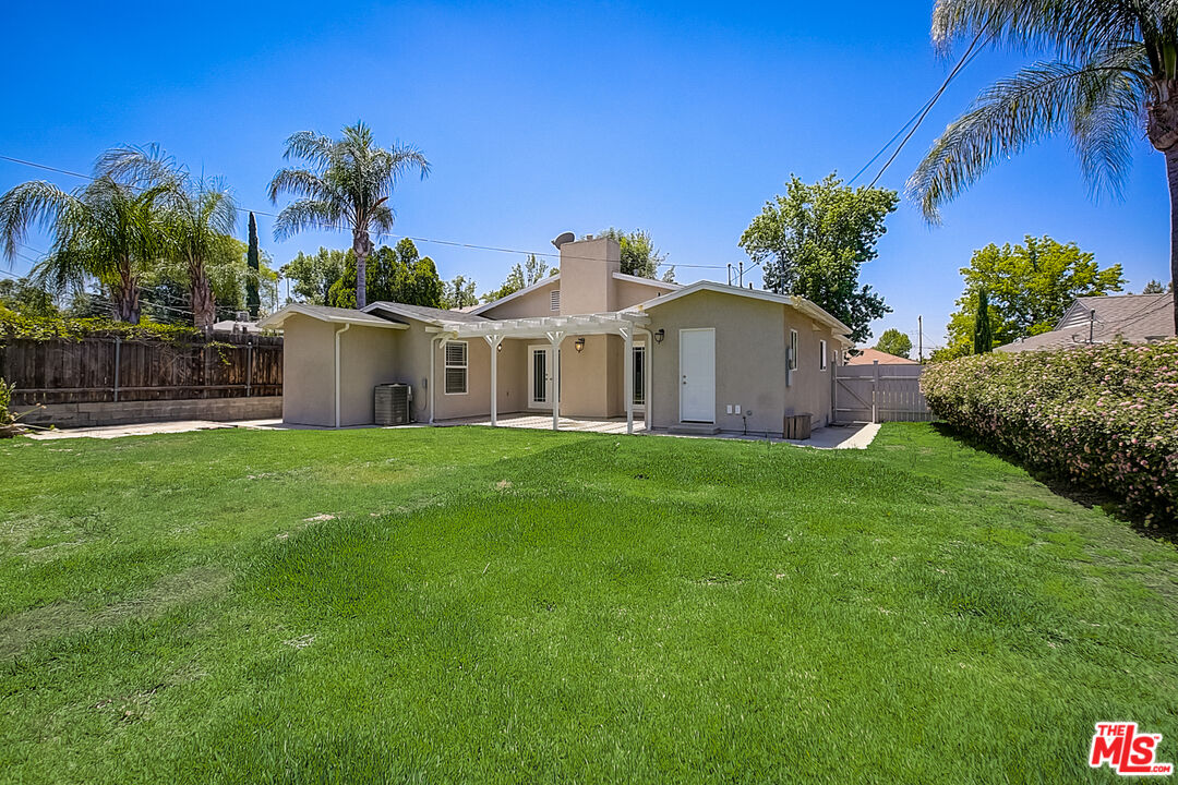 11038 Rhodesia Avenue Sunland, CA 91040 - Photo 35 of 36 a front view of a house with garden