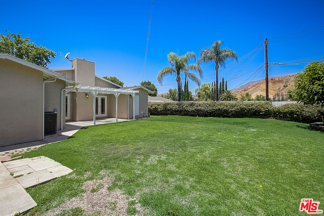 11038 Rhodesia Avenue Sunland, CA 91040 - Photo 36 of 36 a front view of a house with garden