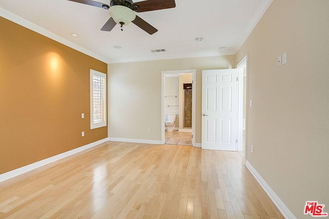 11038 Rhodesia Avenue Sunland, CA 91040 - Photo 6 of 36 a view of an empty room with a window