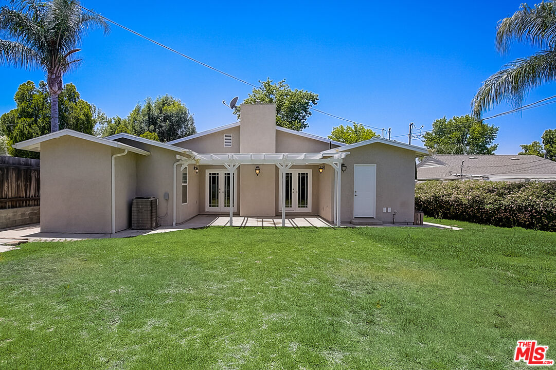 11038 Rhodesia Avenue Sunland, CA 91040 - Photo 8 of 36 a front view of a house with a garden