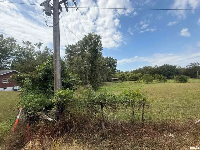 a sign on the side of a road