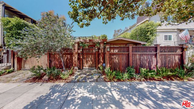 a spacious bathroom with a tub and shower