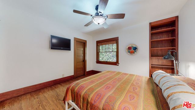 a outdoor space with the couches and dining table with the balcony view