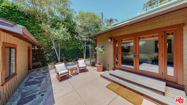 a bathroom with a shower and toilet