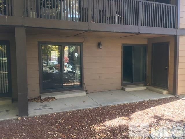 2929 Tierra Verde East Reno, NV 89512 - Photo 3 of 10 a view of backyard with entryway