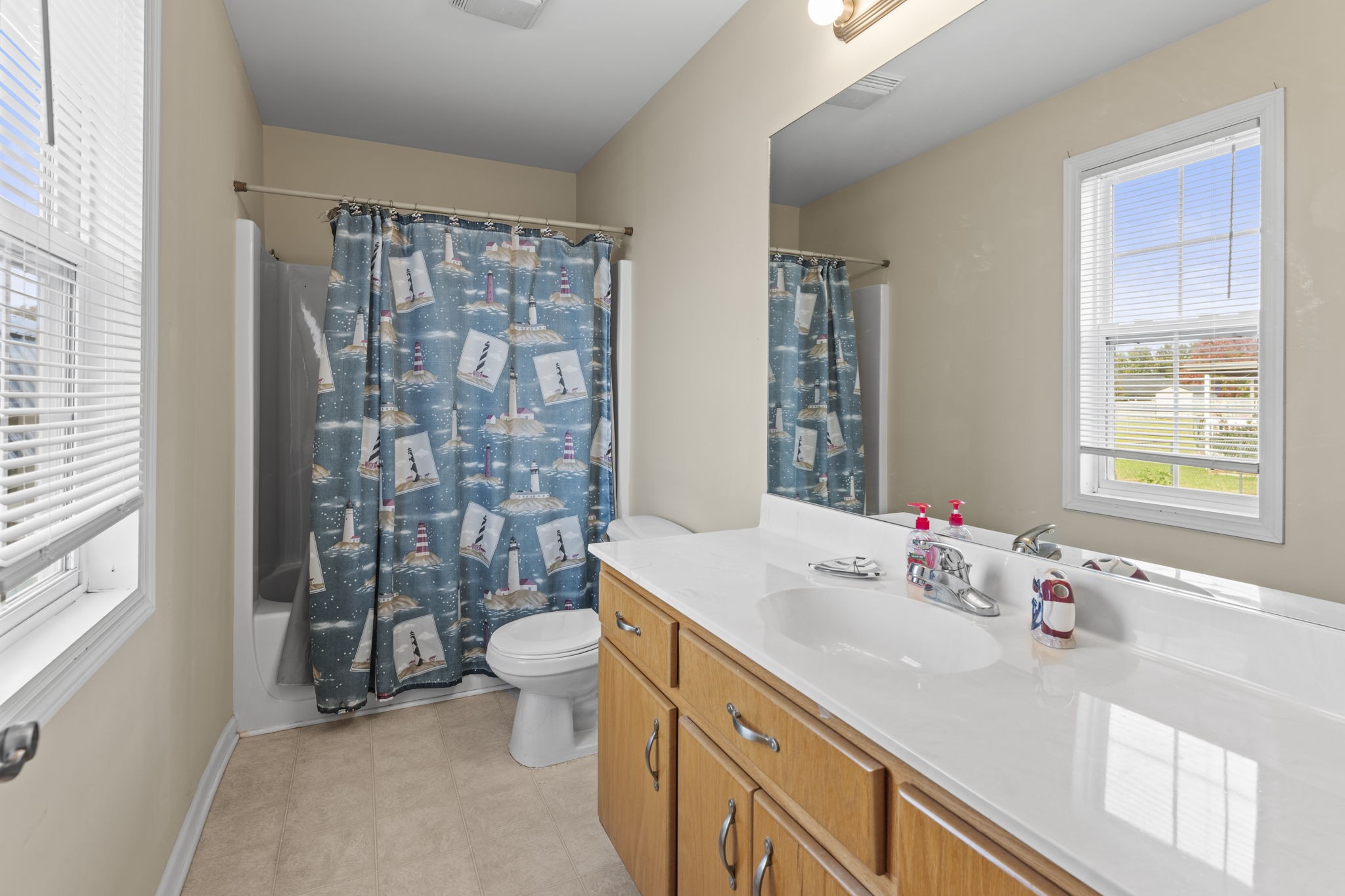 159 Apple Drive Winchester, TN 37398 - Photo 14 of 32 a bathroom with a sink vanity mirror and toilet