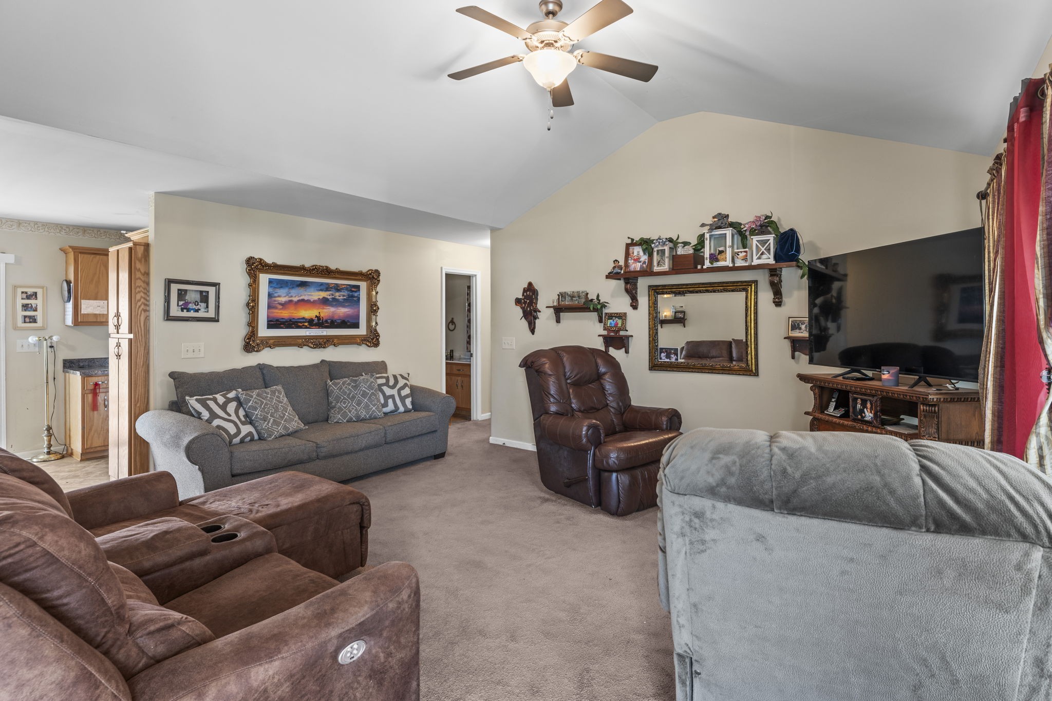 159 Apple Drive Winchester, TN 37398 - Photo 5 of 32 a living room with furniture a ceiling fan and a flat screen tv