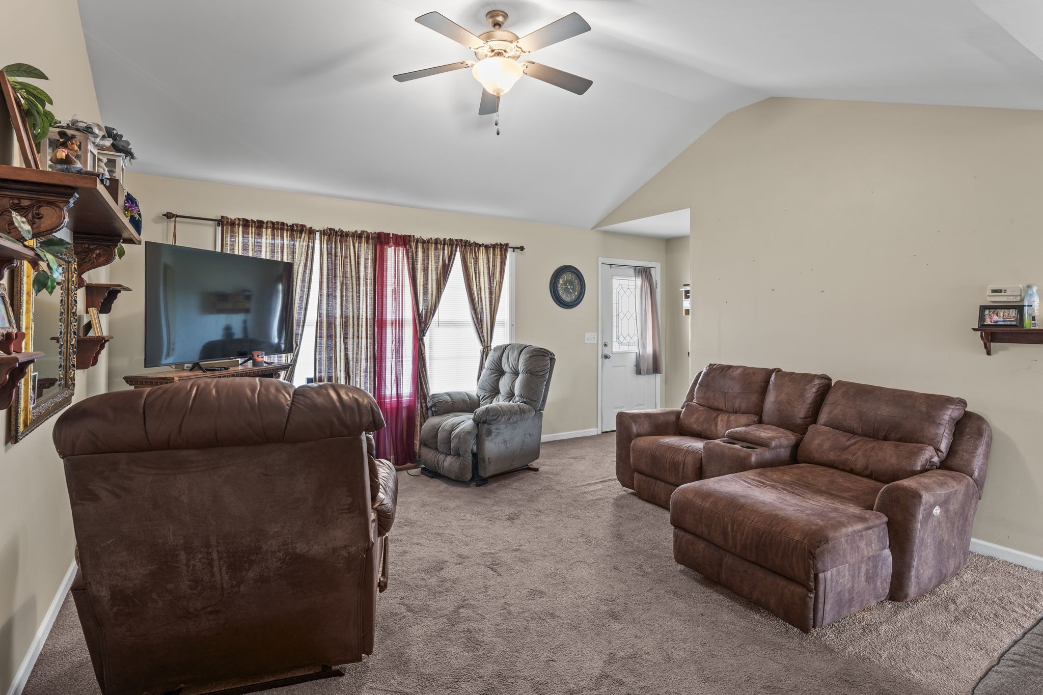 159 Apple Drive Winchester, TN 37398 - Photo 6 of 32 a living room with furniture and a chandelier