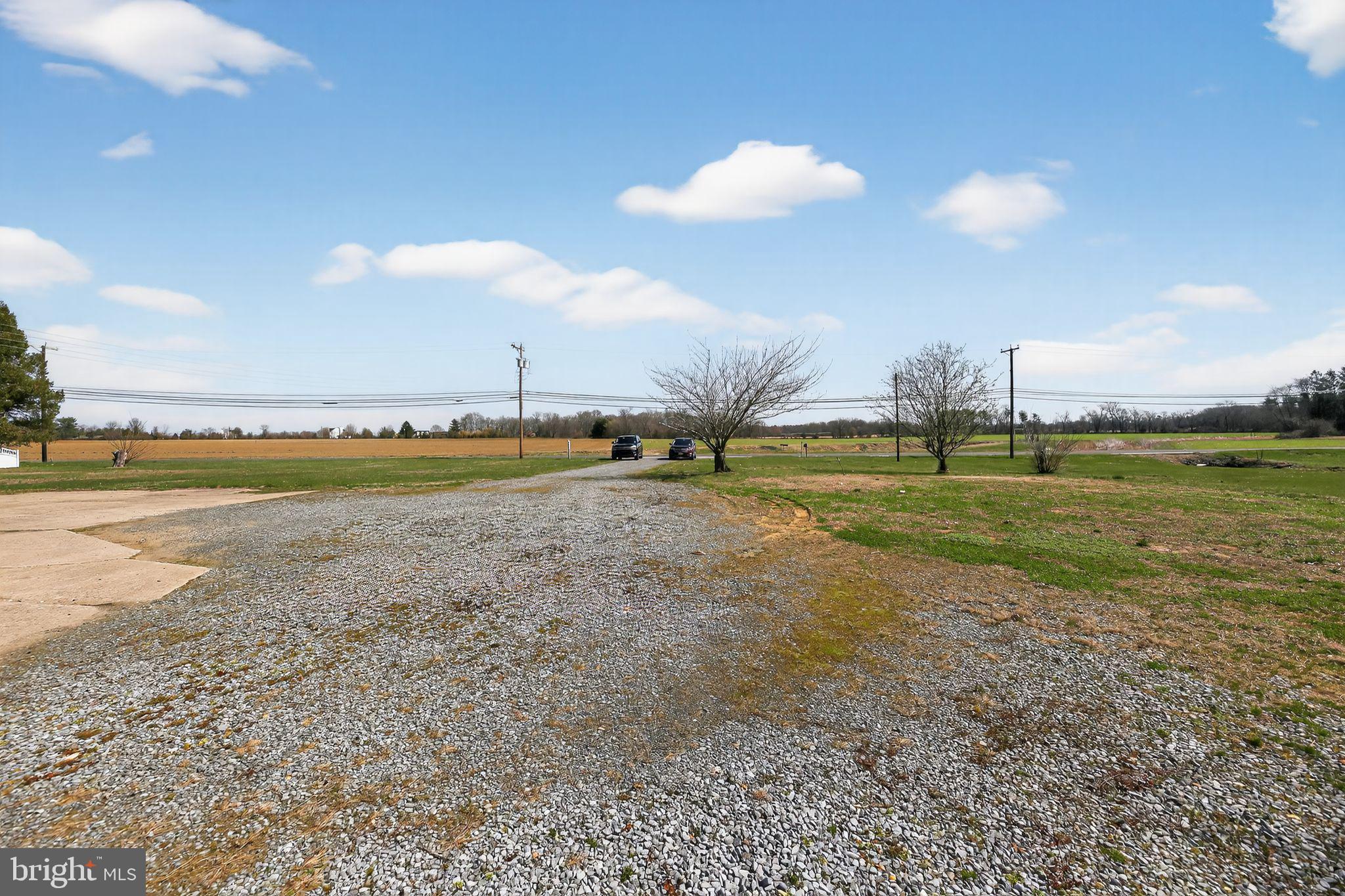 305 Wolfert Station Road Mullica Hill, NJ 08062 - Photo 13 of 15 a view of a lake and a building
