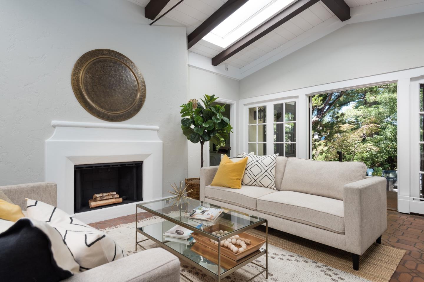 53 Lloyden Drive Atherton, CA 94027 - Photo 17 of 34 a living room with furniture and a fireplace
