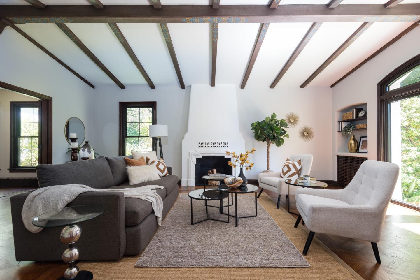 53 Lloyden Drive Atherton, CA 94027 - Photo 6 of 34 a living room with furniture a fireplace and a potted plant