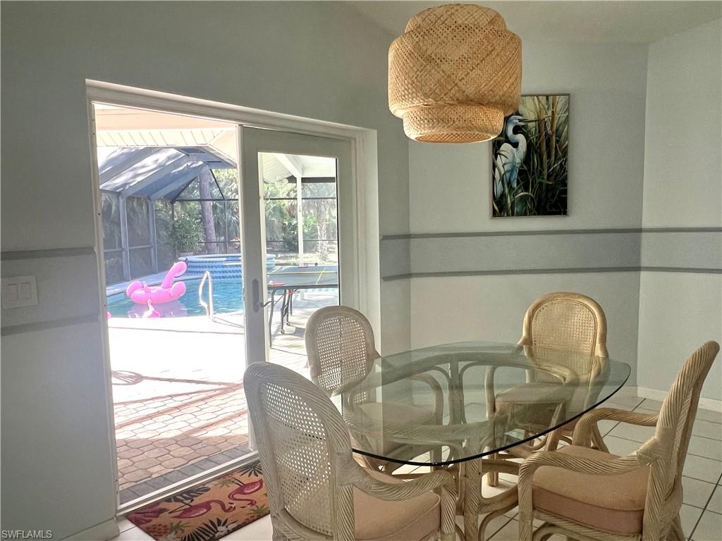 3221 64th Street Southwest Naples, FL 34105 - Photo 12 of 12 French Doors to Lanai