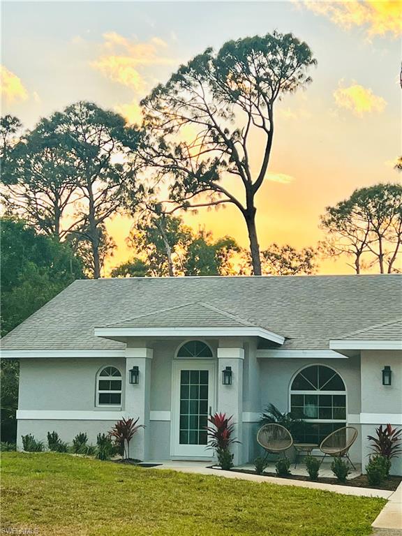 3221 64th Street Southwest Naples, FL 34105 - Photo 5 of 12 Ranch-style home featuring western exposure
