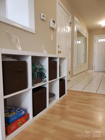 a room with a bed and a window
