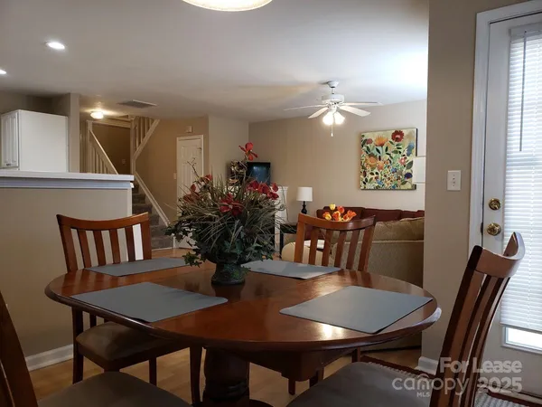 a view of a dining room with furniture