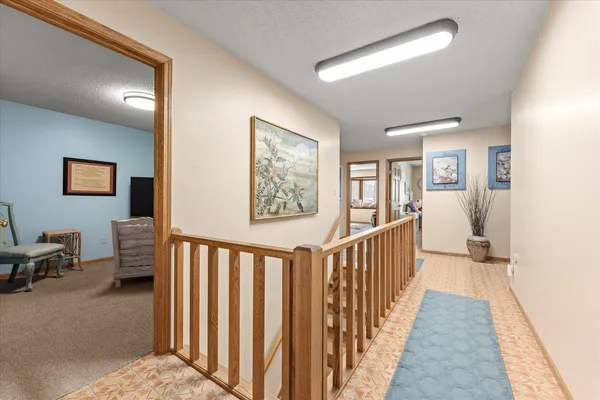 a view of a hallway with workspace