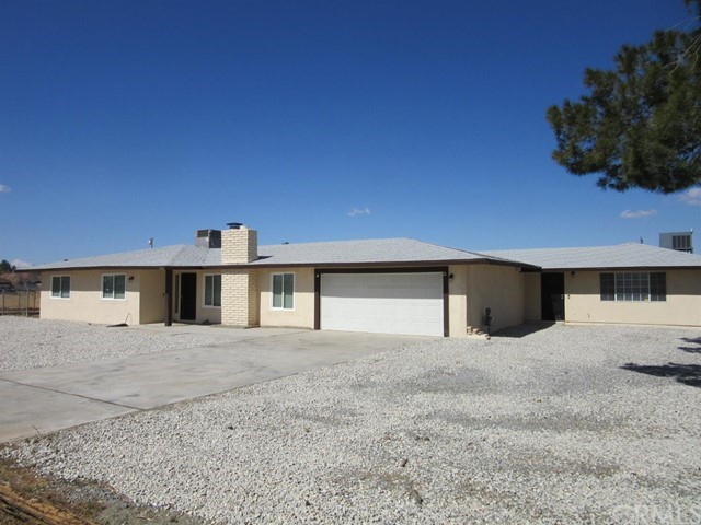14940 Gayhead Road Apple Valley, CA 92307 - Photo 1 of 1 a view of a house with a yard