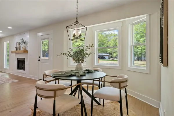 a living room with furniture and a rug