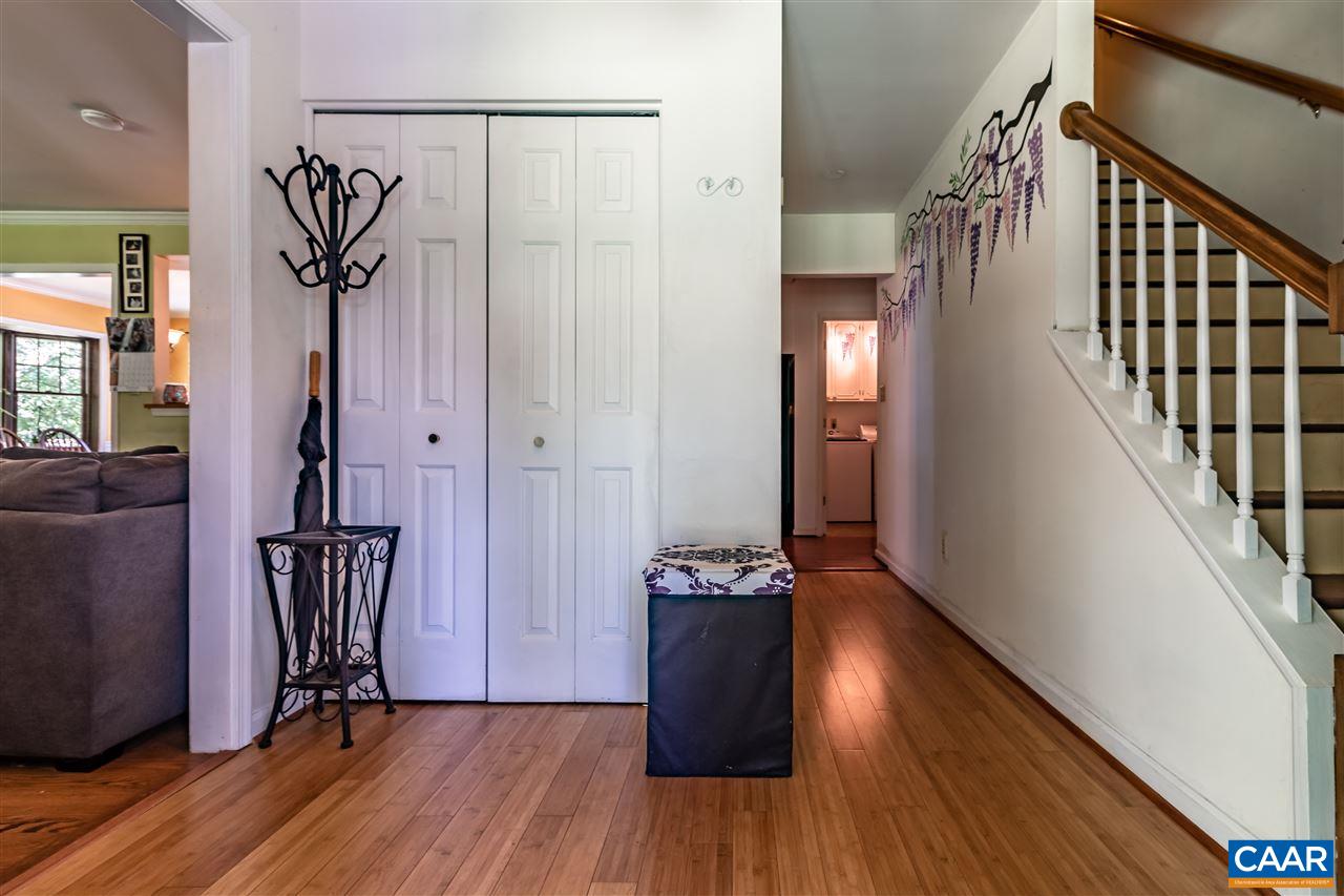 575 Gillums Ridge Road Charlottesville, VA 22903 - Photo 12 of 27 a view of front door with wooden floor and stairs